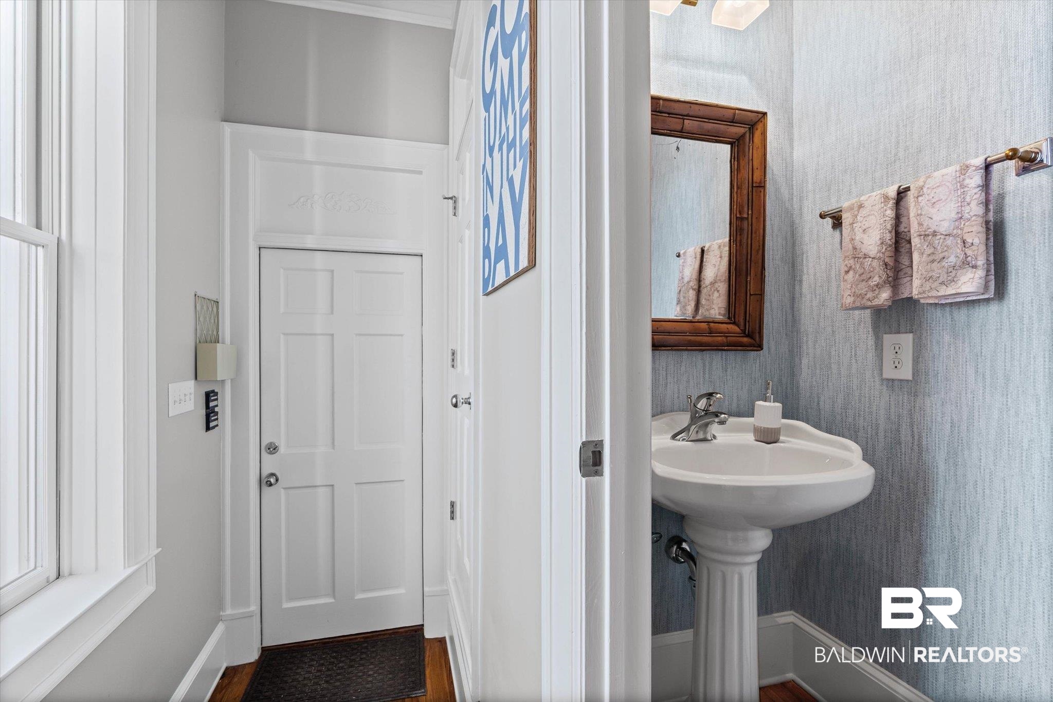 7015 Bay Road Mobile, AL 36605 - Photo 29 of 53 Bathroom featuring wallpapered walls and dark wood-style floors