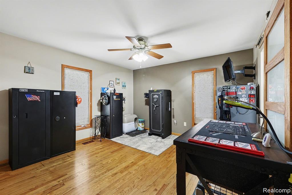 7277 Cardinal Road Algonac, MI 48001 - Photo 31 of 36 Rec room featuring light wood-style floors and a ceiling fan