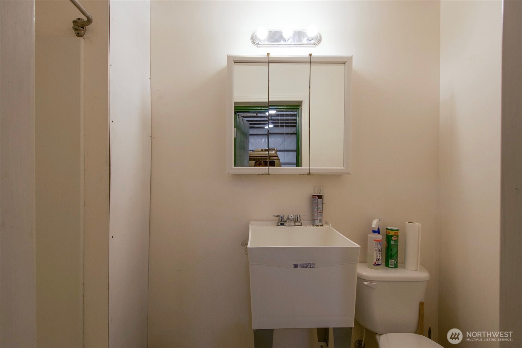 191 Airport Road Port Townsend, WA 98368 - Photo 9 of 27 a bathroom with a sink mirror and toilet