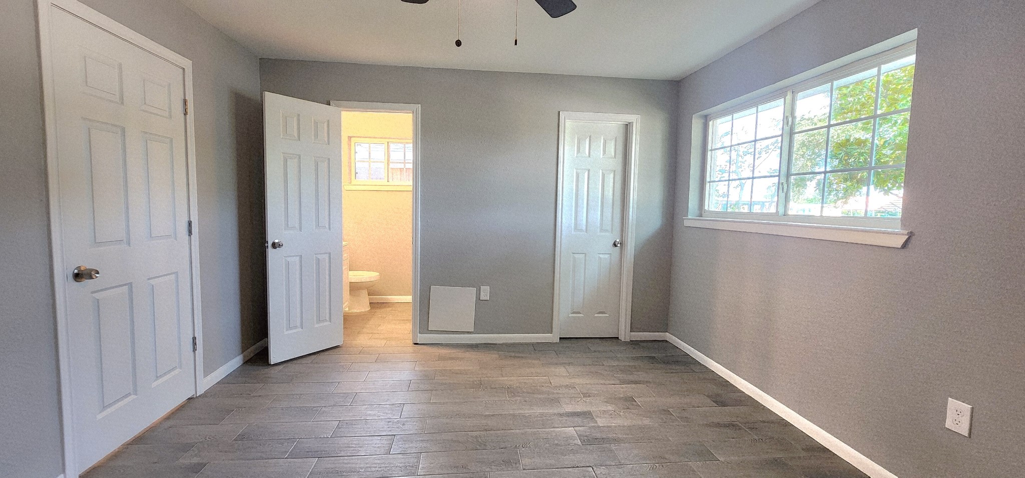 5914 Newquay Street Houston, TX 77085 - Photo 12 of 43 a view of an empty room with a window