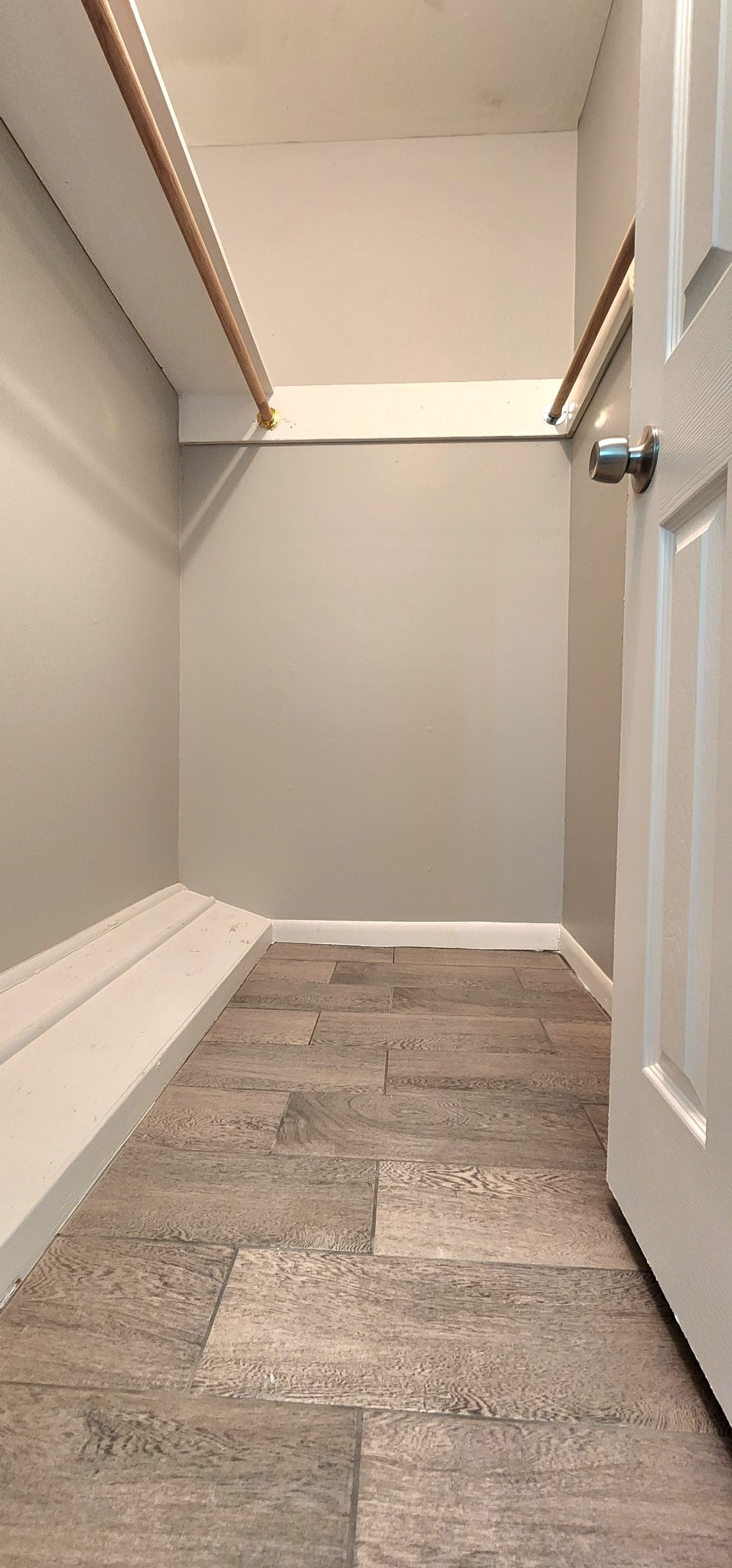 5914 Newquay Street Houston, TX 77085 - Photo 16 of 43 a view of a room with racks on the wall