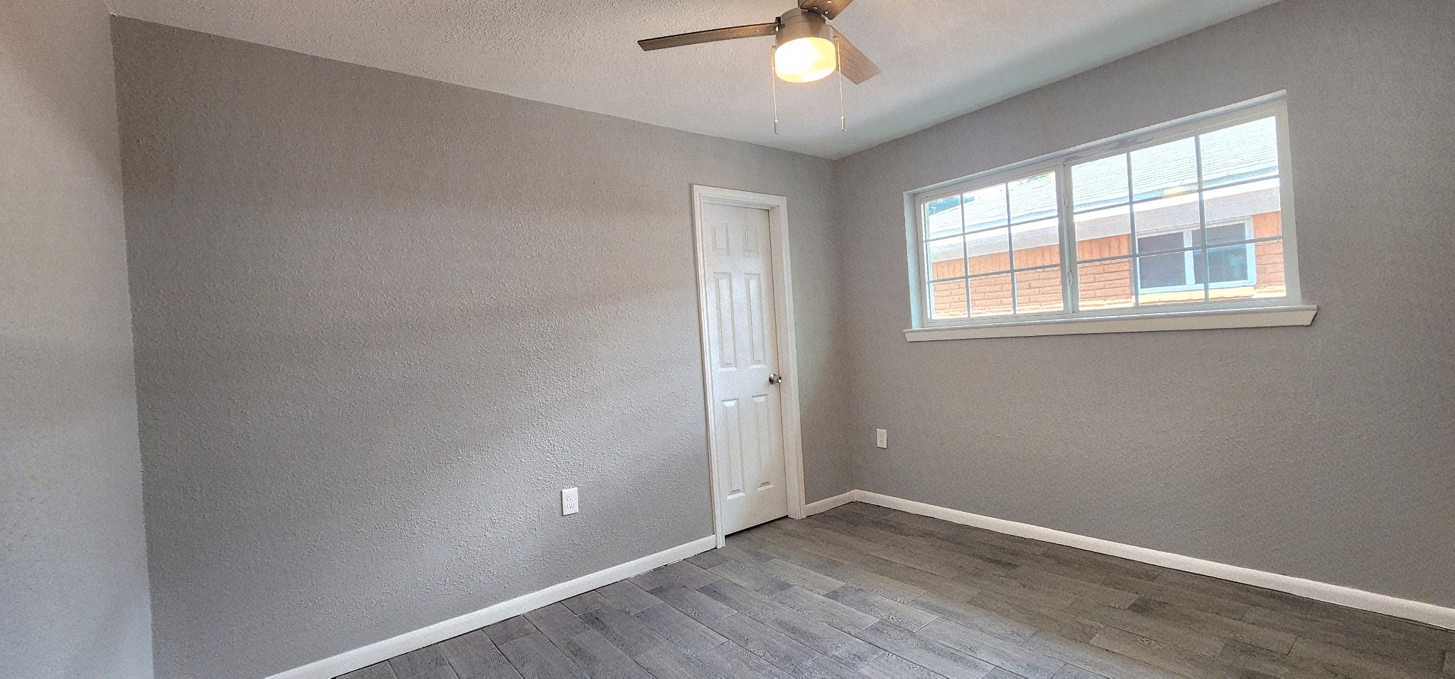 5914 Newquay Street Houston, TX 77085 - Photo 18 of 43 an empty room with window