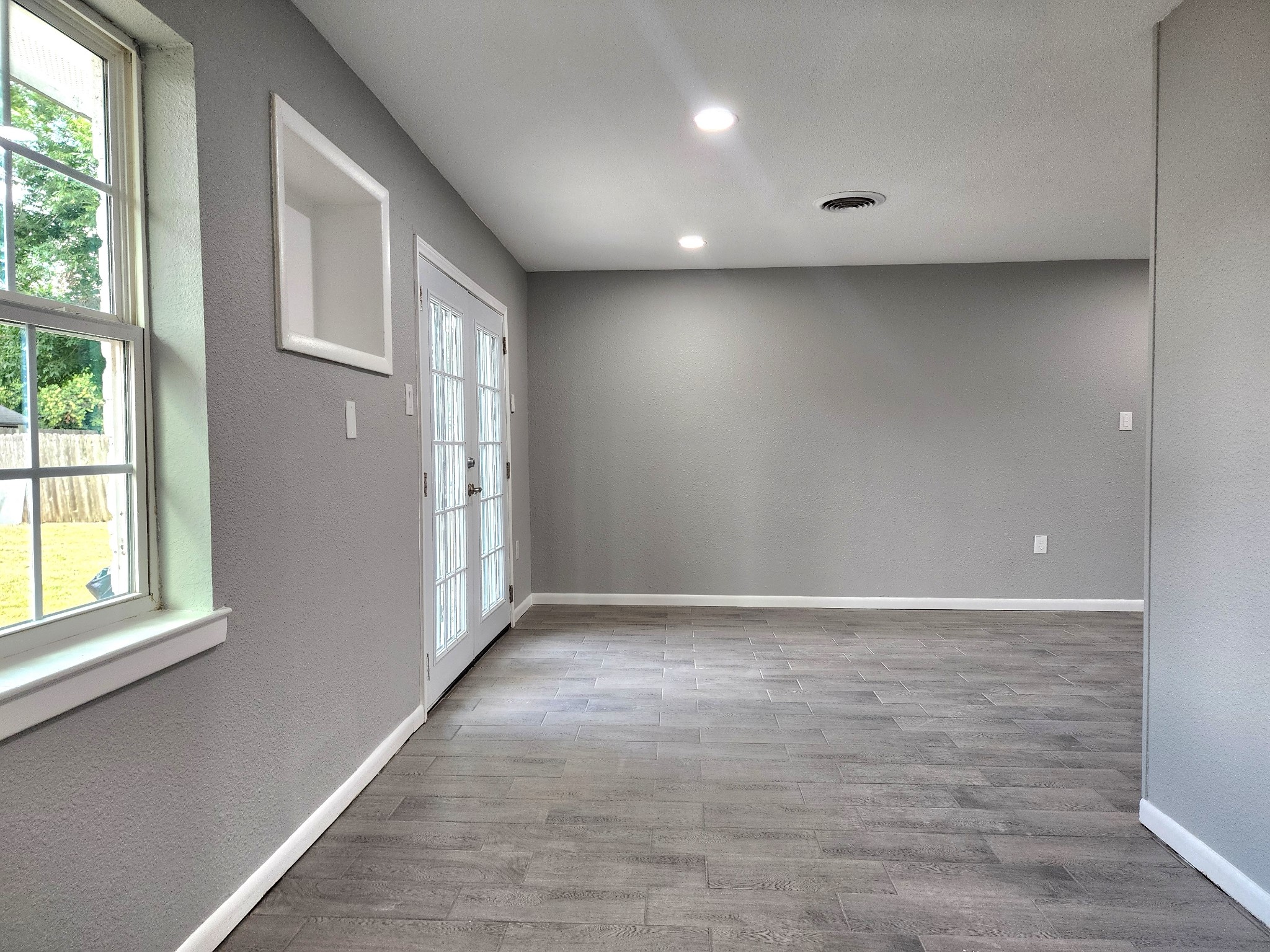 5914 Newquay Street Houston, TX 77085 - Photo 31 of 43 a view of an empty room with a window