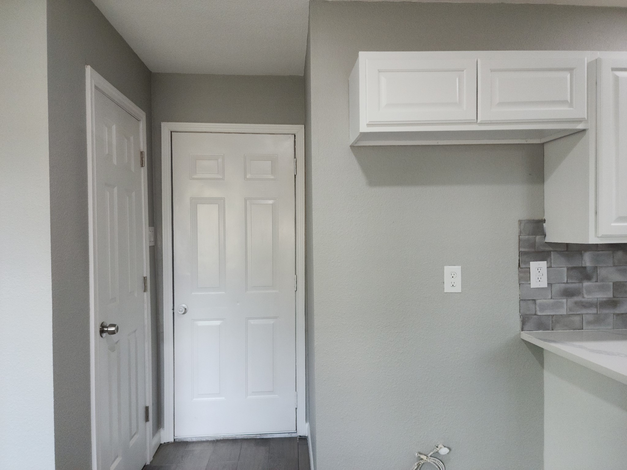 5914 Newquay Street Houston, TX 77085 - Photo 36 of 43 a view of cabinets and wooden floor