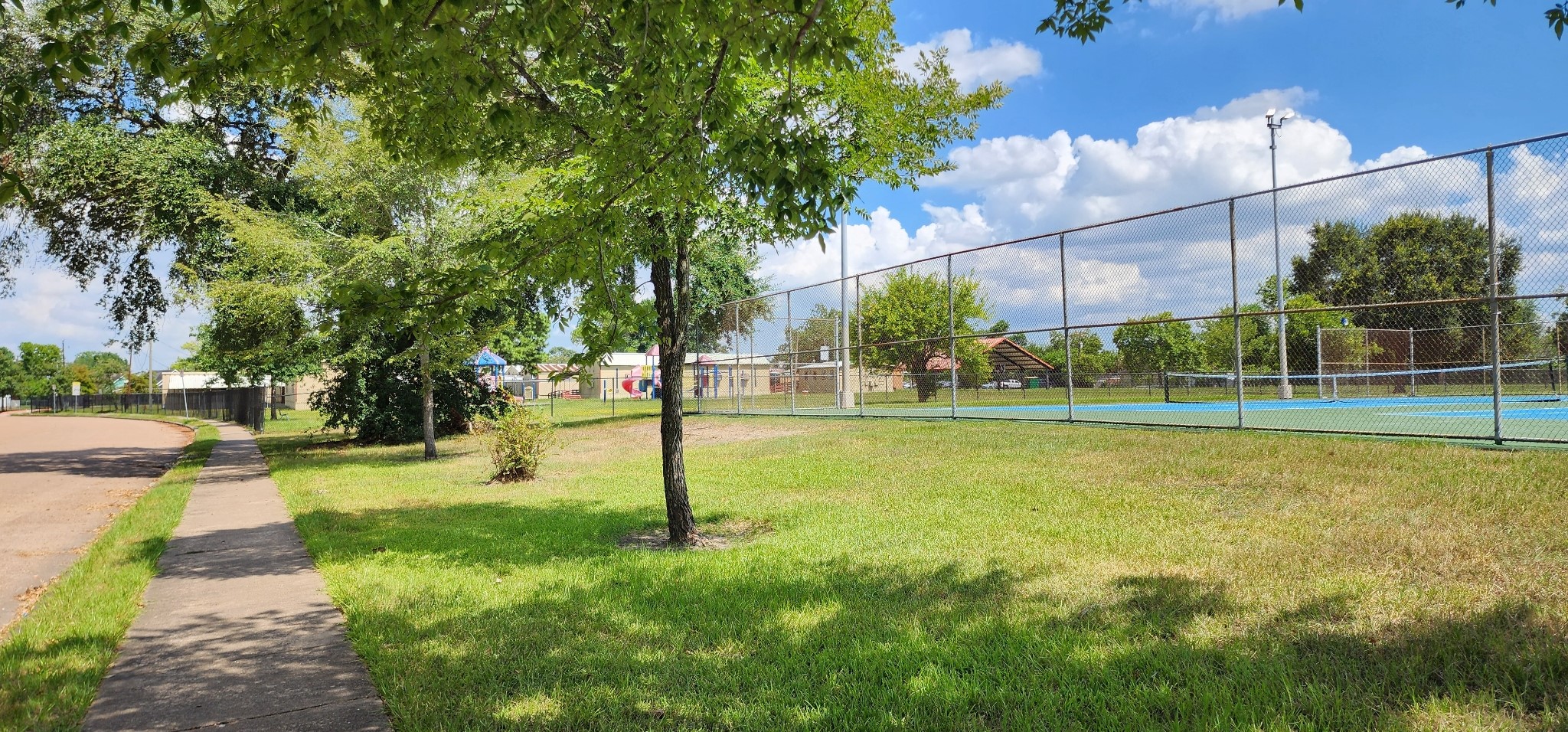 5914 Newquay Street Houston, TX 77085 - Photo 41 of 43 a view of a park with basketball court