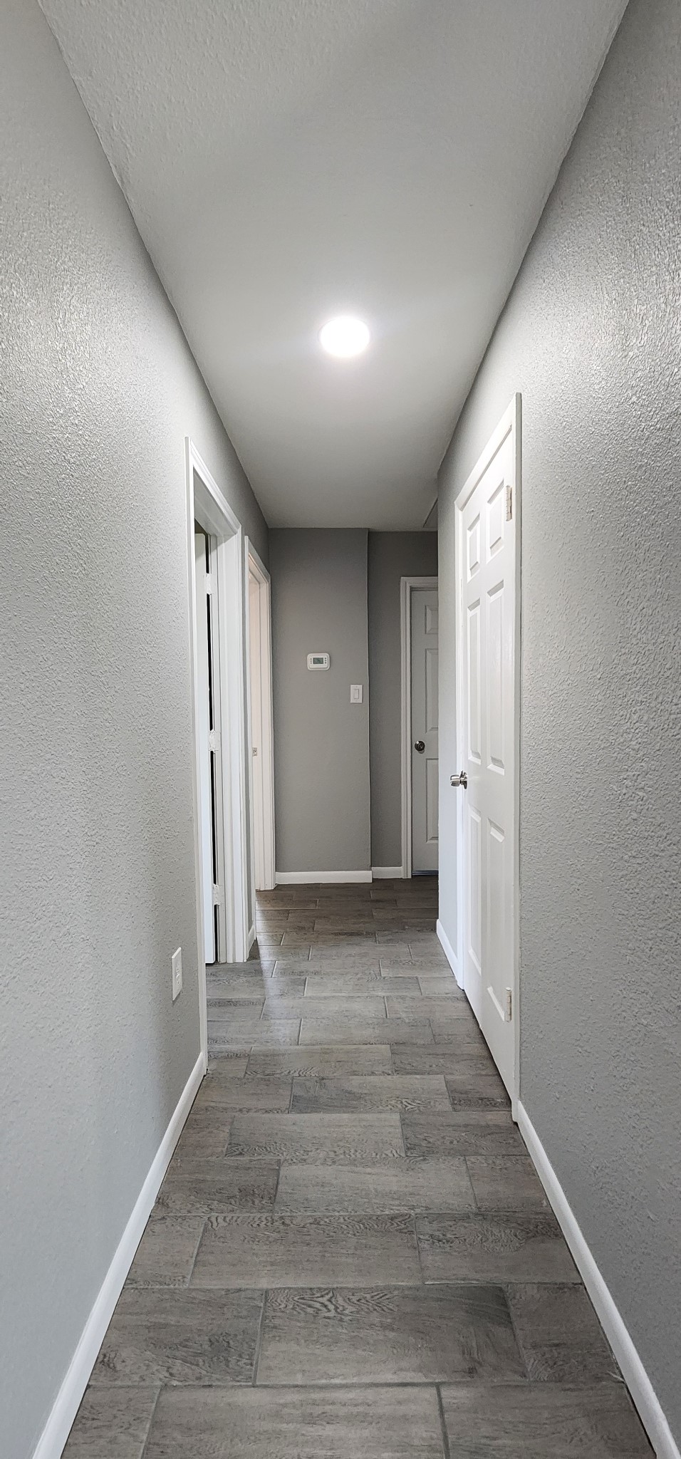 5914 Newquay Street Houston, TX 77085 - Photo 10 of 43 a view of a hallway