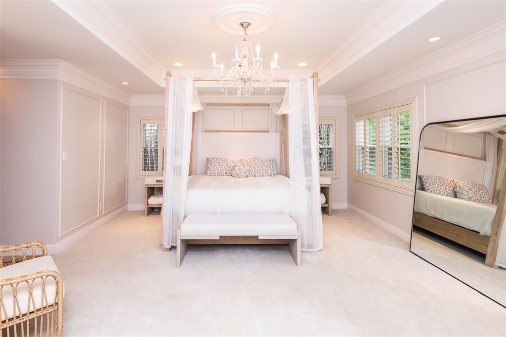 1001 Nottingham Street Orlando, FL 32803 - Photo 17 of 49 a large white bed sitting in a room next to a window