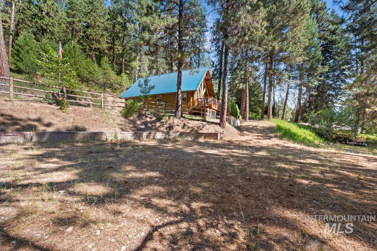 10 Elk Point Road Garden Valley, ID 83622 - Photo 42 of 42 View of yard with view of wooded area