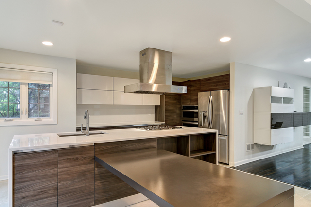 1000 Laurie Lane Burr Ridge, IL 60527 - Photo 13 of 36 a kitchen with stainless steel appliances granite countertop a sink and a stove