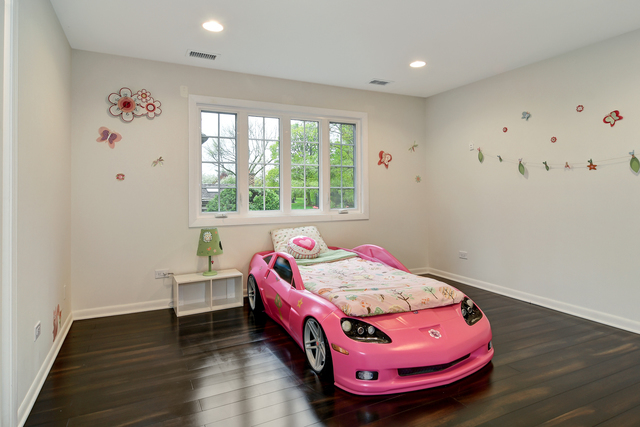 1000 Laurie Lane Burr Ridge, IL 60527 - Photo 24 of 36 a bedroom with furniture and window