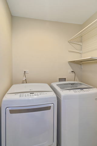 1000 Laurie Lane Burr Ridge, IL 60527 - Photo 29 of 36 a utility room with dryer and washer