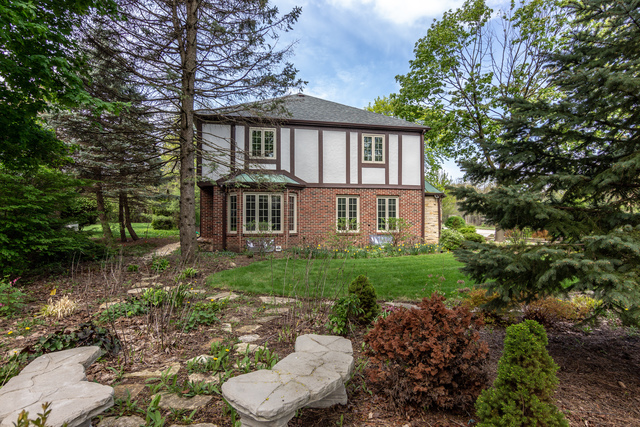 1000 Laurie Lane Burr Ridge, IL 60527 - Photo 35 of 36 a view of a front of house with a yard