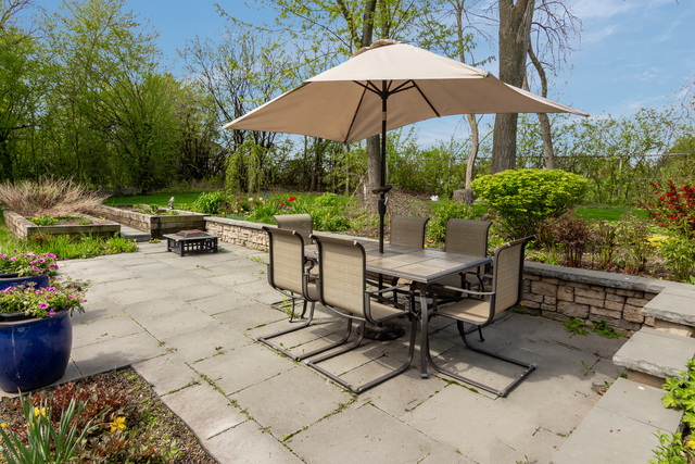 1000 Laurie Lane Burr Ridge, IL 60527 - Photo 36 of 36 a view of a backyard with sitting area and furniture
