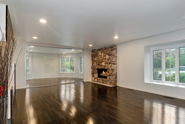 1000 Laurie Lane Burr Ridge, IL 60527 - Photo 6 of 36 wooden floor in an empty room with a window