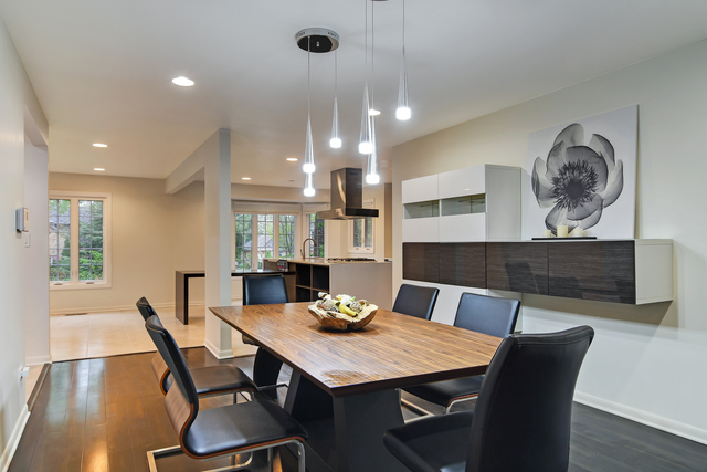 1000 Laurie Lane Burr Ridge, IL 60527 - Photo 9 of 36 a view of a dining room with furniture and wooden floor