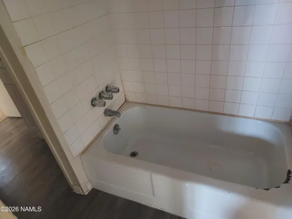 a bathroom with a bathtub