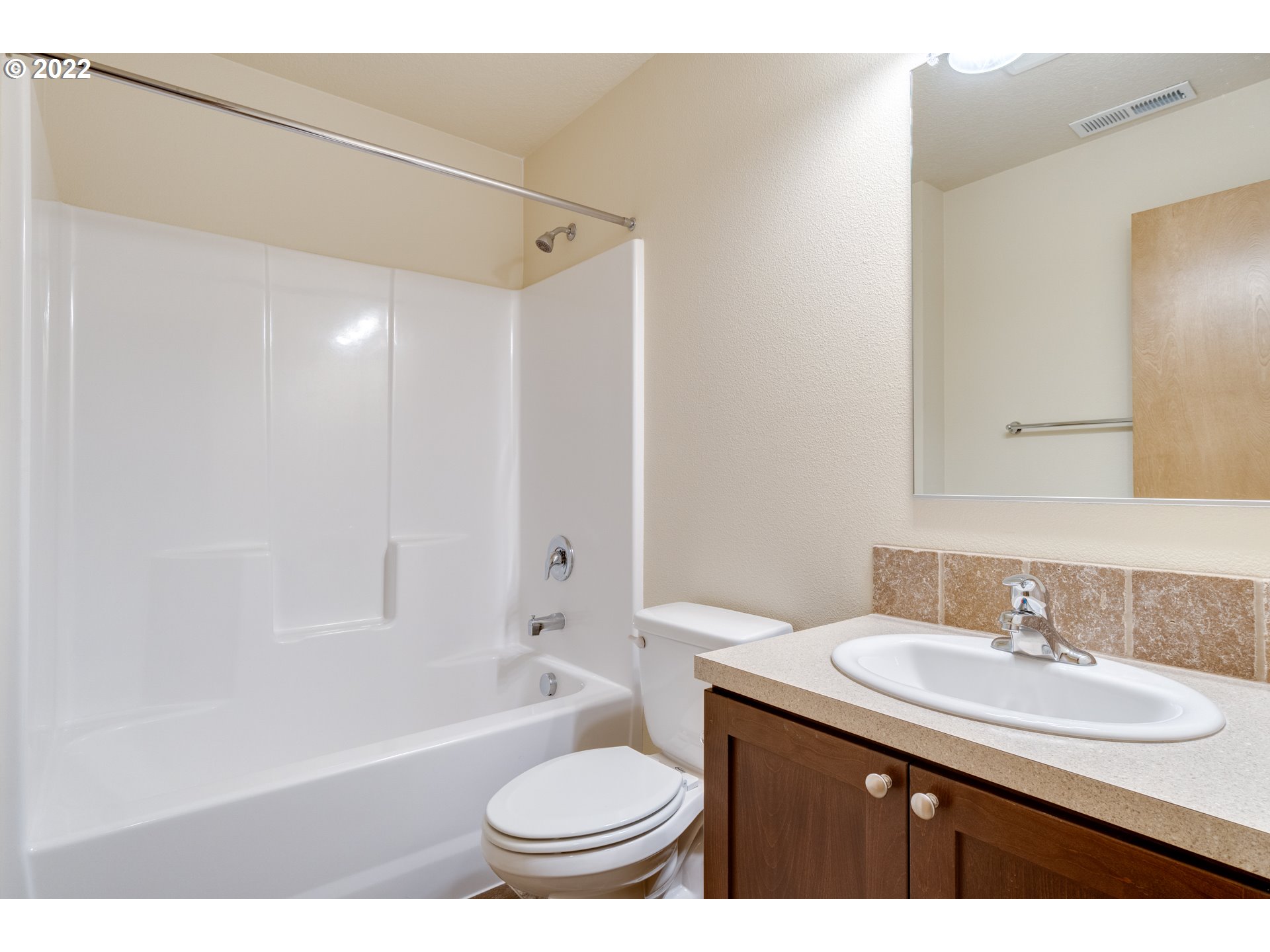 10923 Rees Street Northeast Donald, OR 97020 - Photo 12 of 27 a bathroom with a sink a toilet and a bathtub