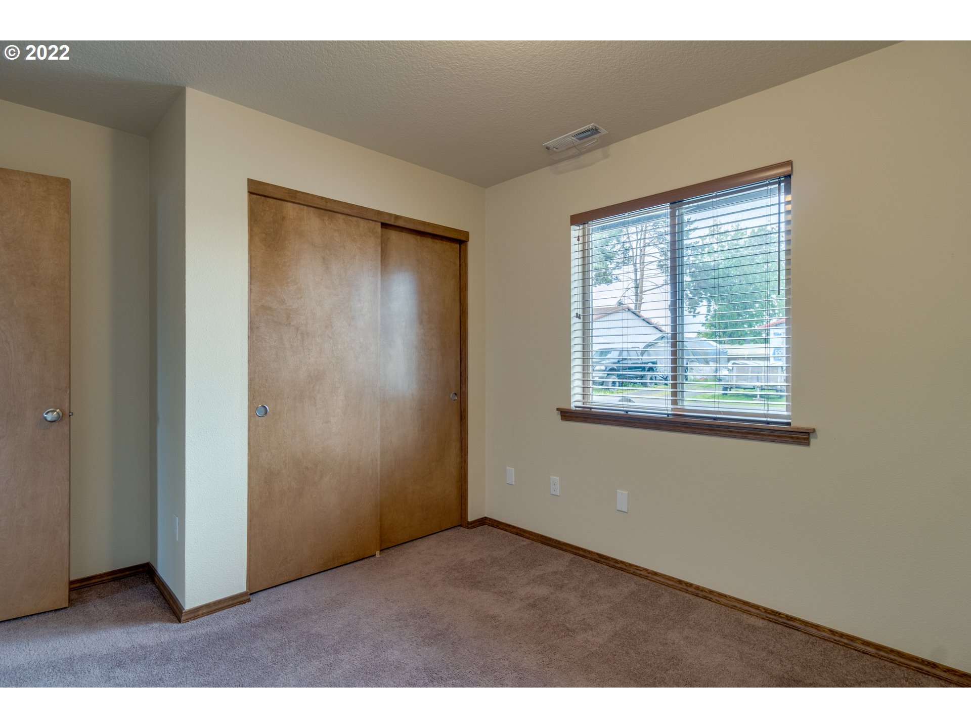 10923 Rees Street Northeast Donald, OR 97020 - Photo 16 of 27 a view of an empty room with a window