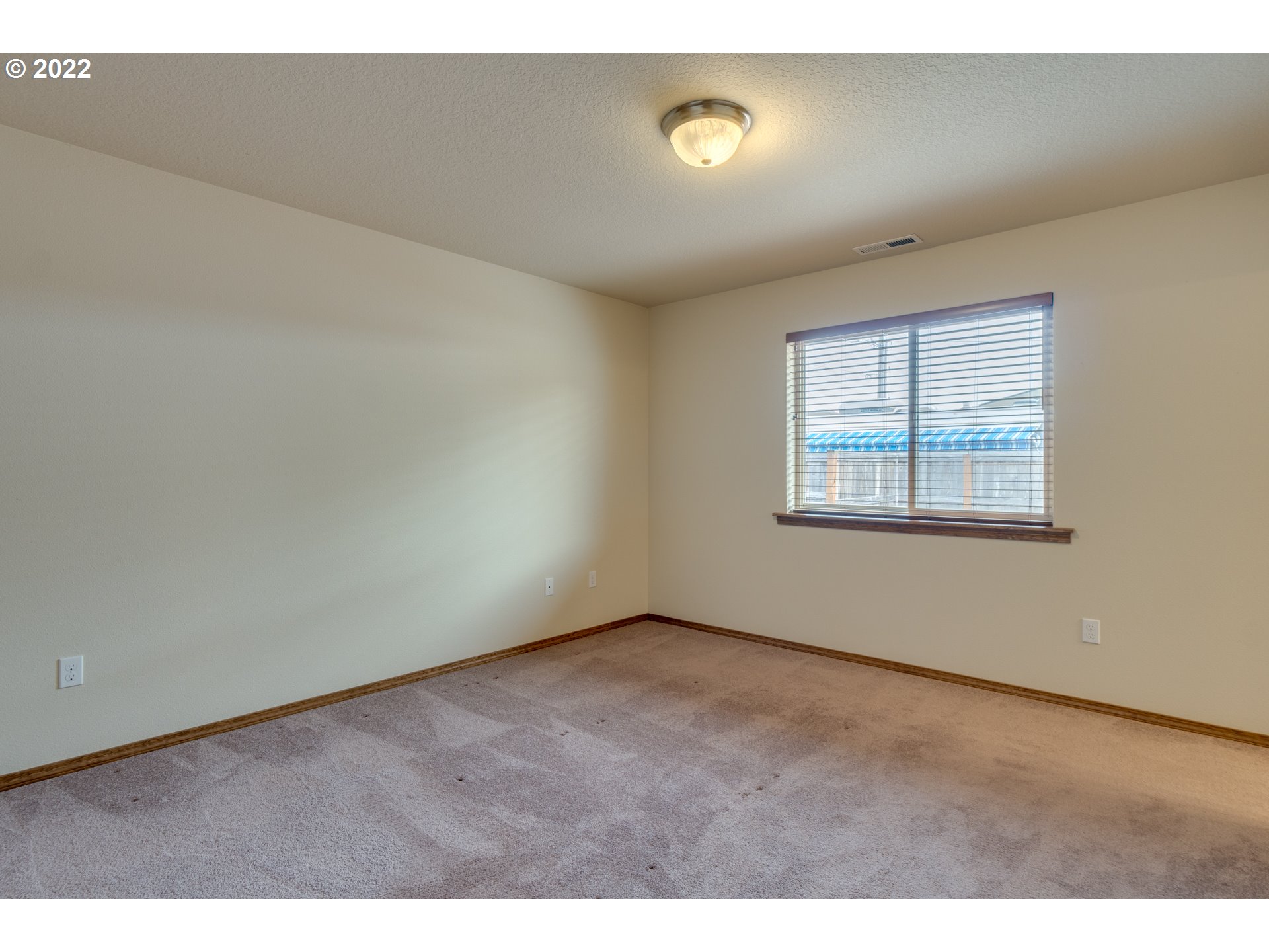 10923 Rees Street Northeast Donald, OR 97020 - Photo 18 of 27 an empty room with windows