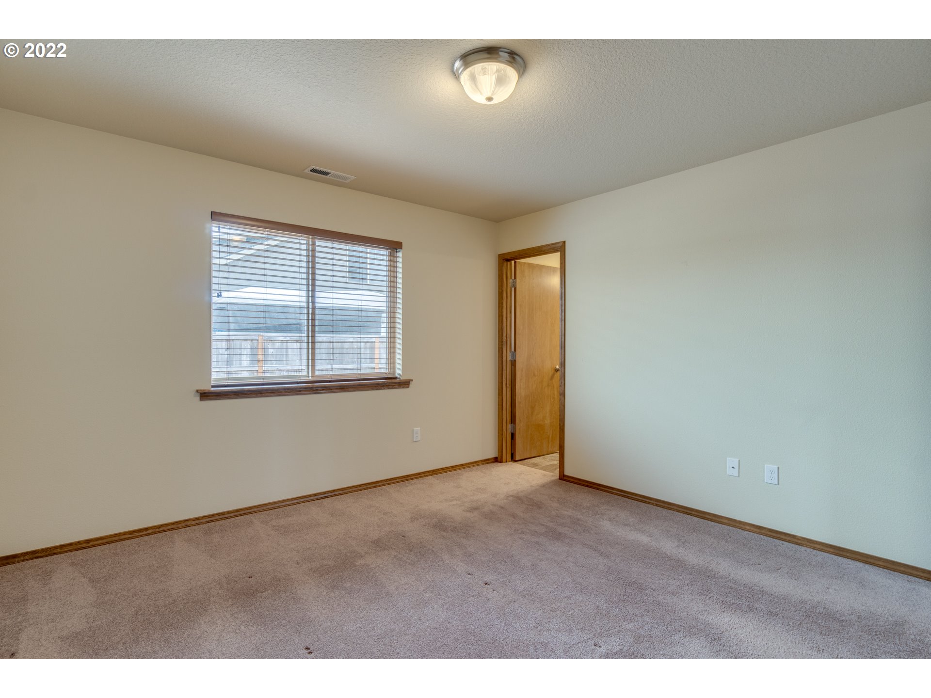 10923 Rees Street Northeast Donald, OR 97020 - Photo 19 of 27 an empty room with windows