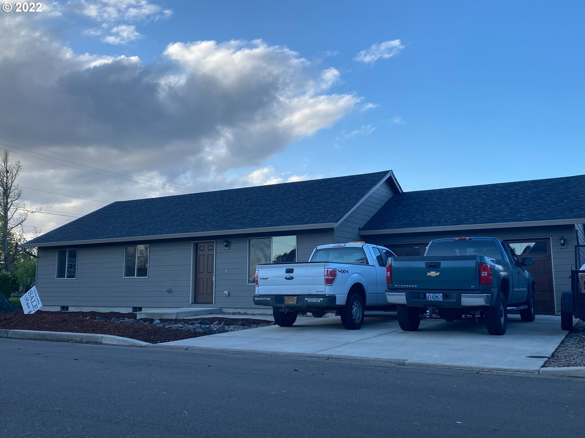 10923 Rees Street Northeast Donald, OR 97020 - Photo 2 of 27 a view of a cars park in front of a house