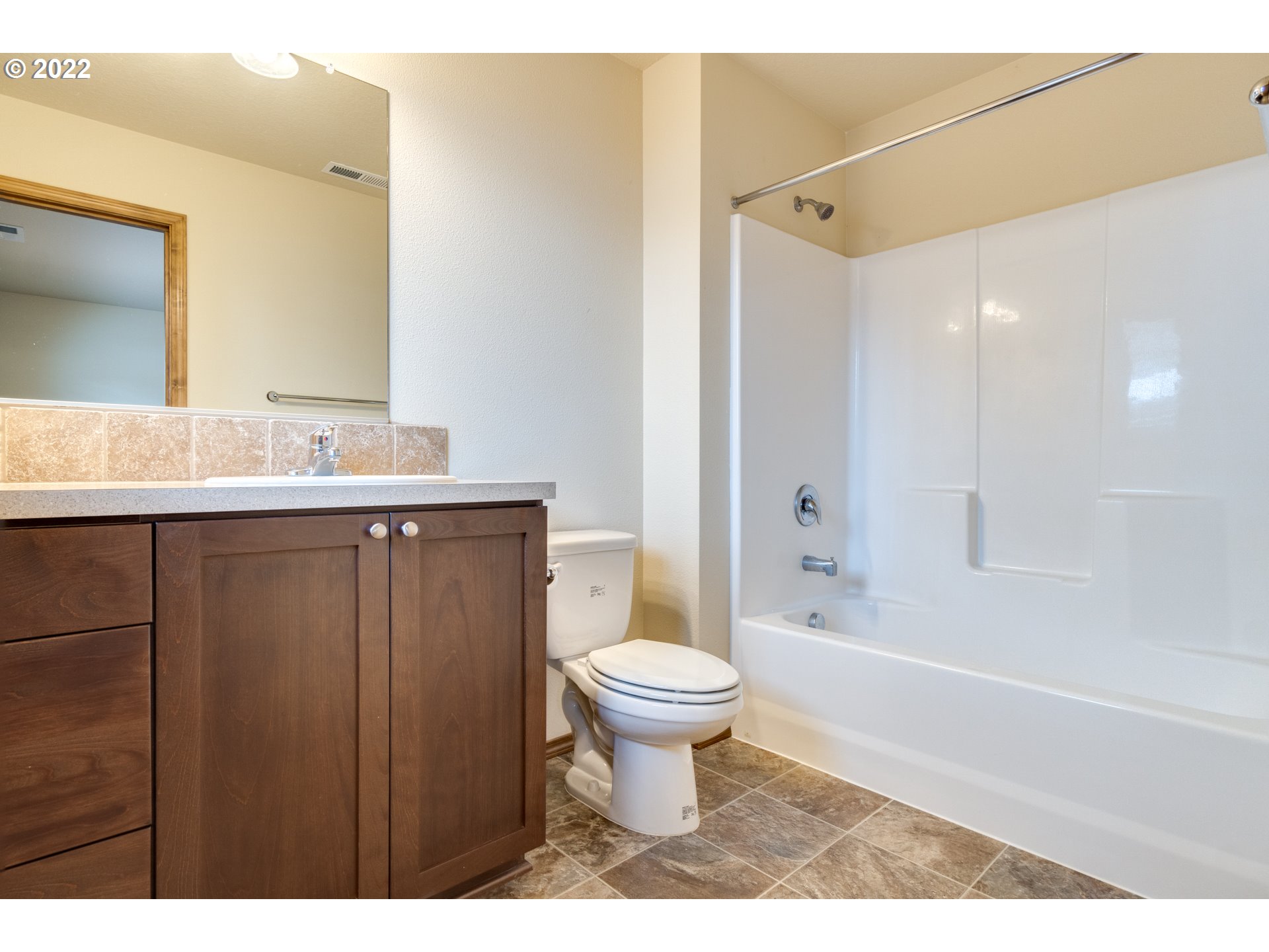 10923 Rees Street Northeast Donald, OR 97020 - Photo 21 of 27 a bathroom with a sink toilet and shower