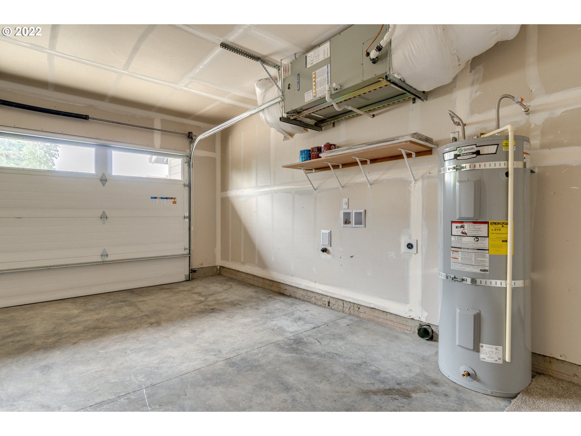 10923 Rees Street Northeast Donald, OR 97020 - Photo 22 of 27 a view of a room with wooden shelves