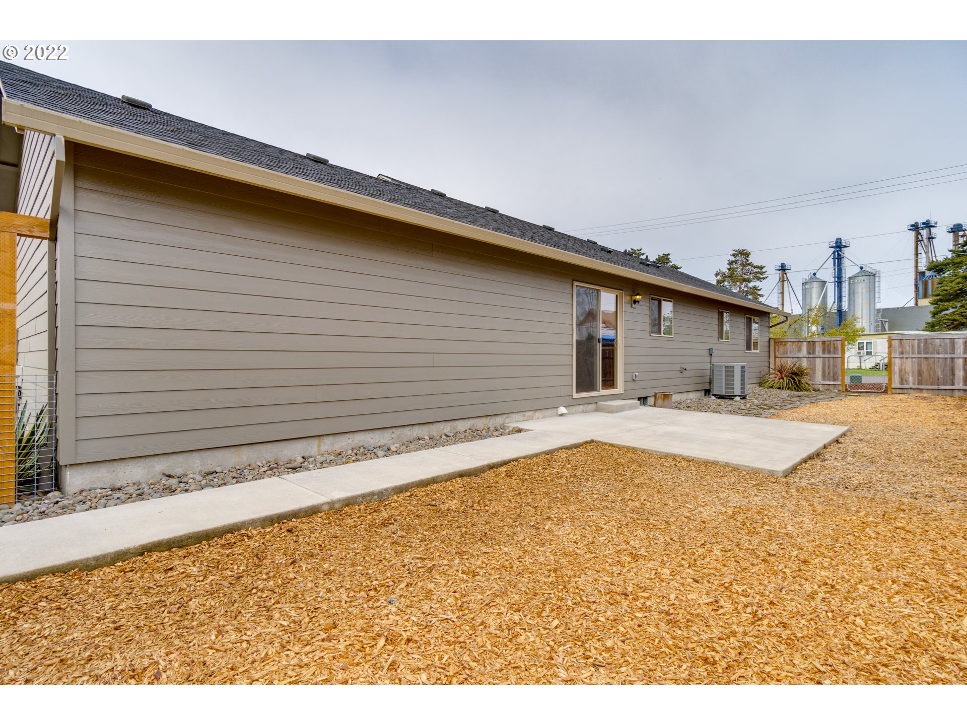 10923 Rees Street Northeast Donald, OR 97020 - Photo 25 of 27 a view of a house with a swimming pool