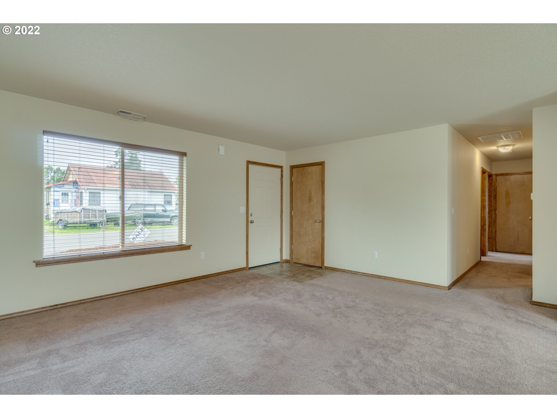 10923 Rees Street Northeast Donald, OR 97020 - Photo 7 of 27 a view of an empty room with a window