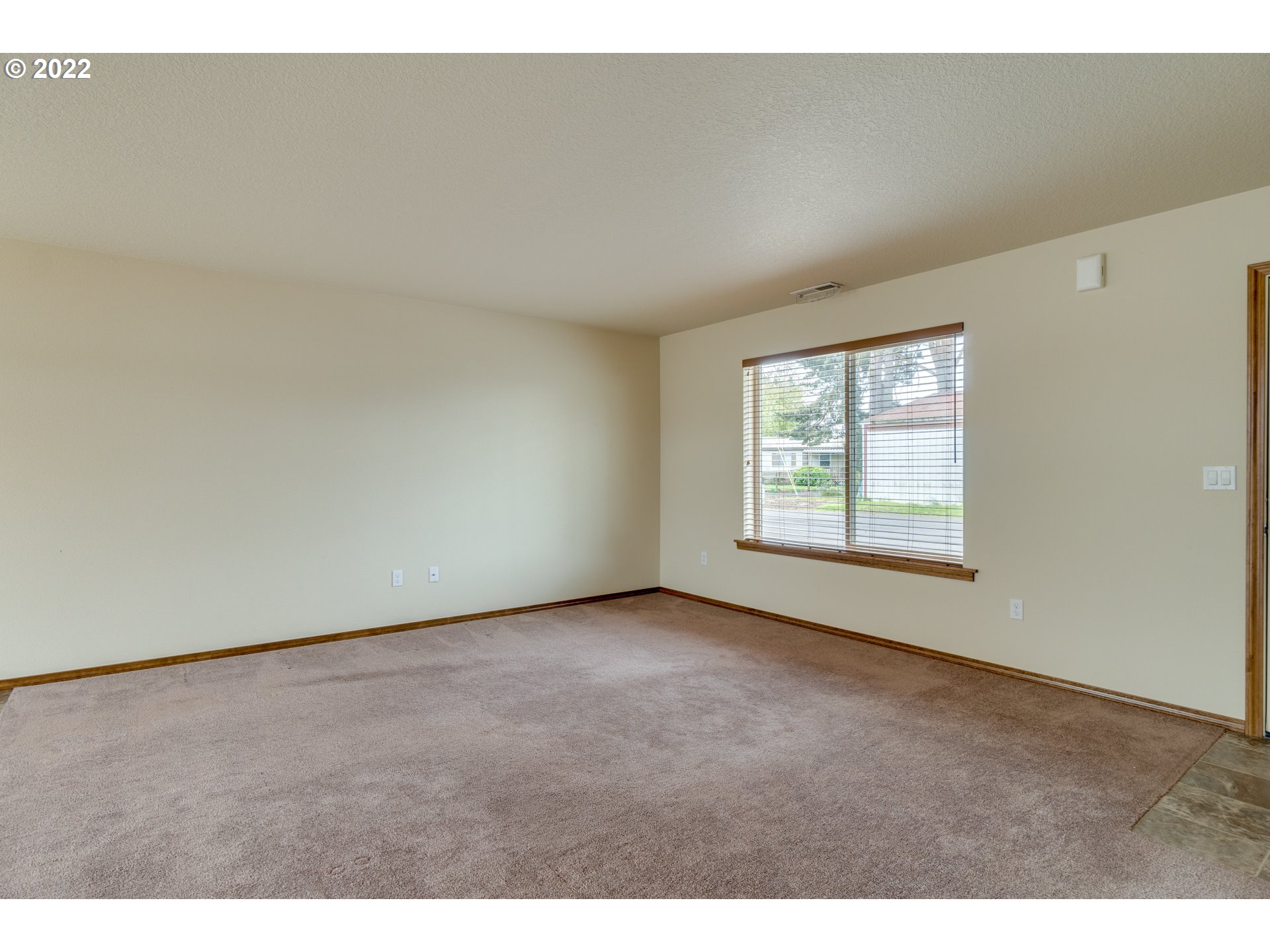10923 Rees Street Northeast Donald, OR 97020 - Photo 8 of 27 an empty room with windows