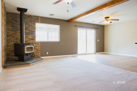 1633 South Farragut Street Ridgecrest, CA 93555 - Photo 11 of 30 a view of an empty room with a window