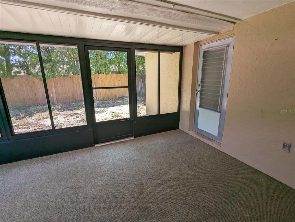 11230 Kapok Avenue Port Richey, FL 34668 - Photo 19 of 19 a view of empty room with front door