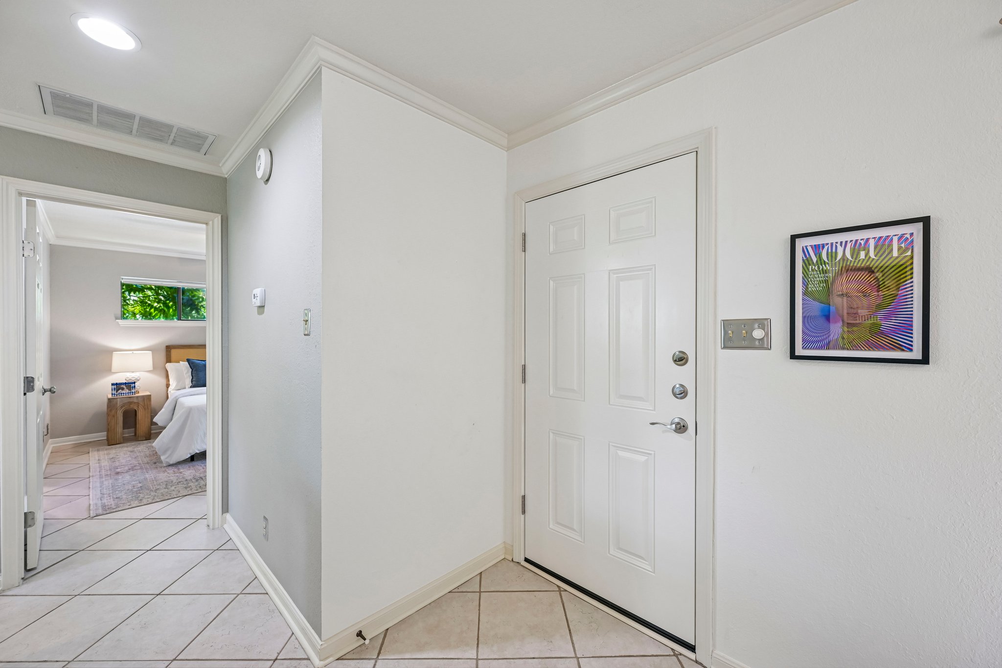 2412 Enfield Road, Unit 8 Austin, TX 78703 - Photo 34 of 34 A proper entry gives the bedroom separation from the main living area, one of those small floor plan details that makes a one bedroom home live much better.