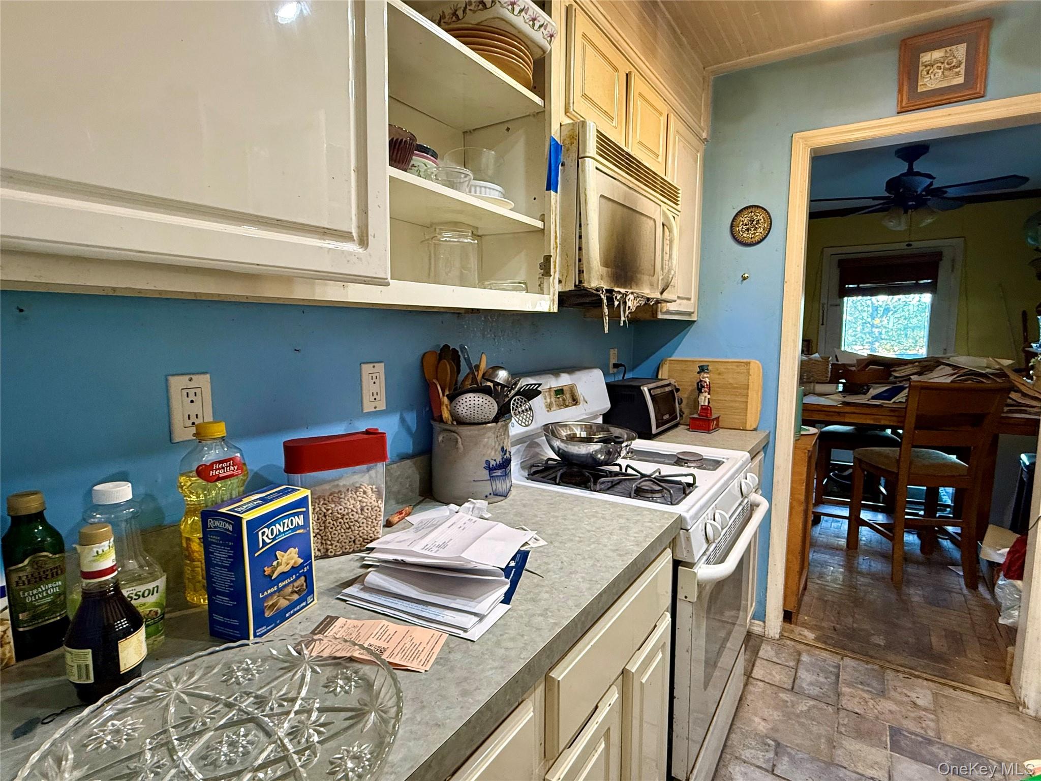 669 Pelham Road, Unit C10 New Rochelle, NY 10805 - Photo 9 of 13 a kitchen with stainless steel appliances granite countertop a sink and a stove