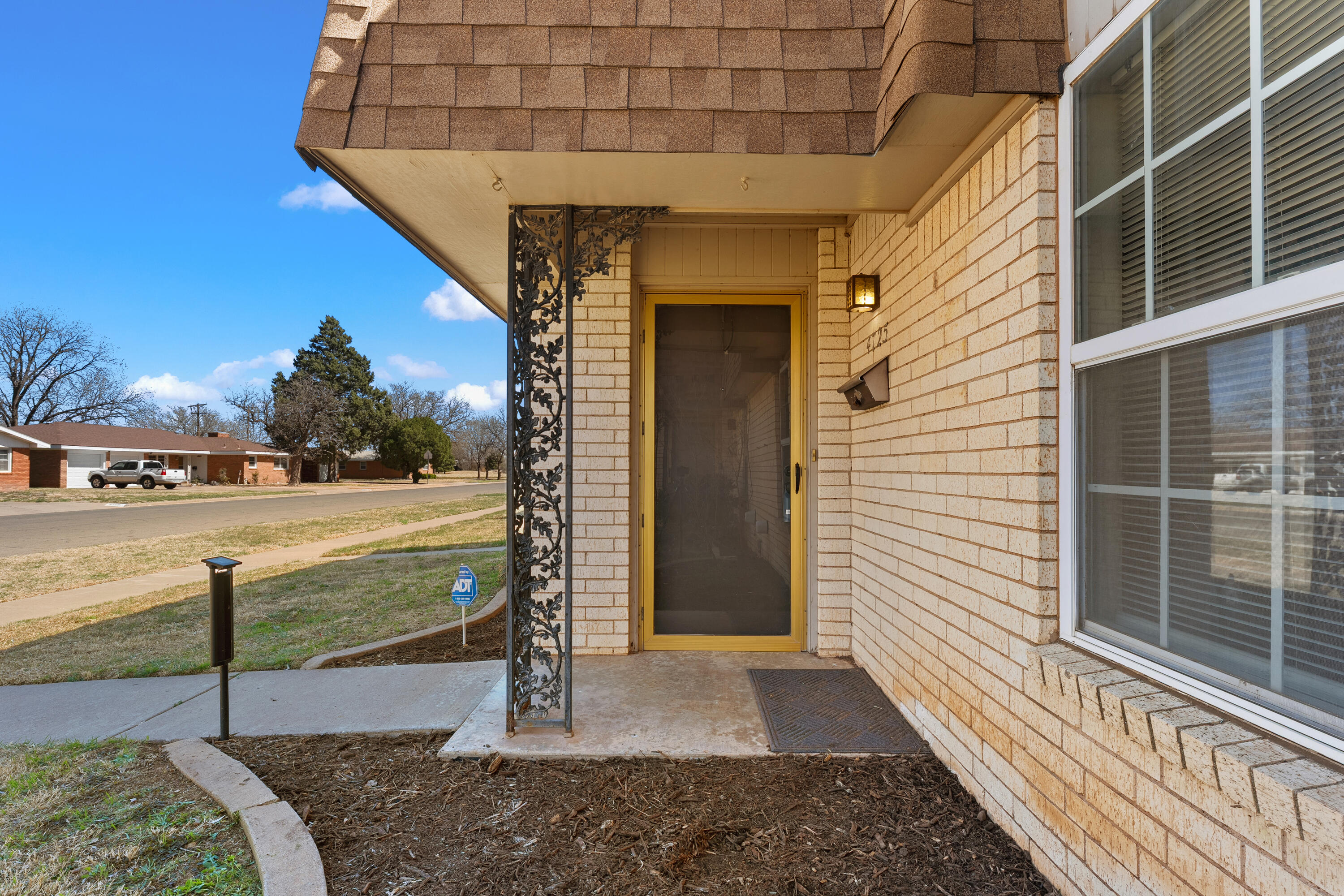 4725 48th Street Lubbock, TX 79414 - Photo 3 of 24 a view of a pathway of a house