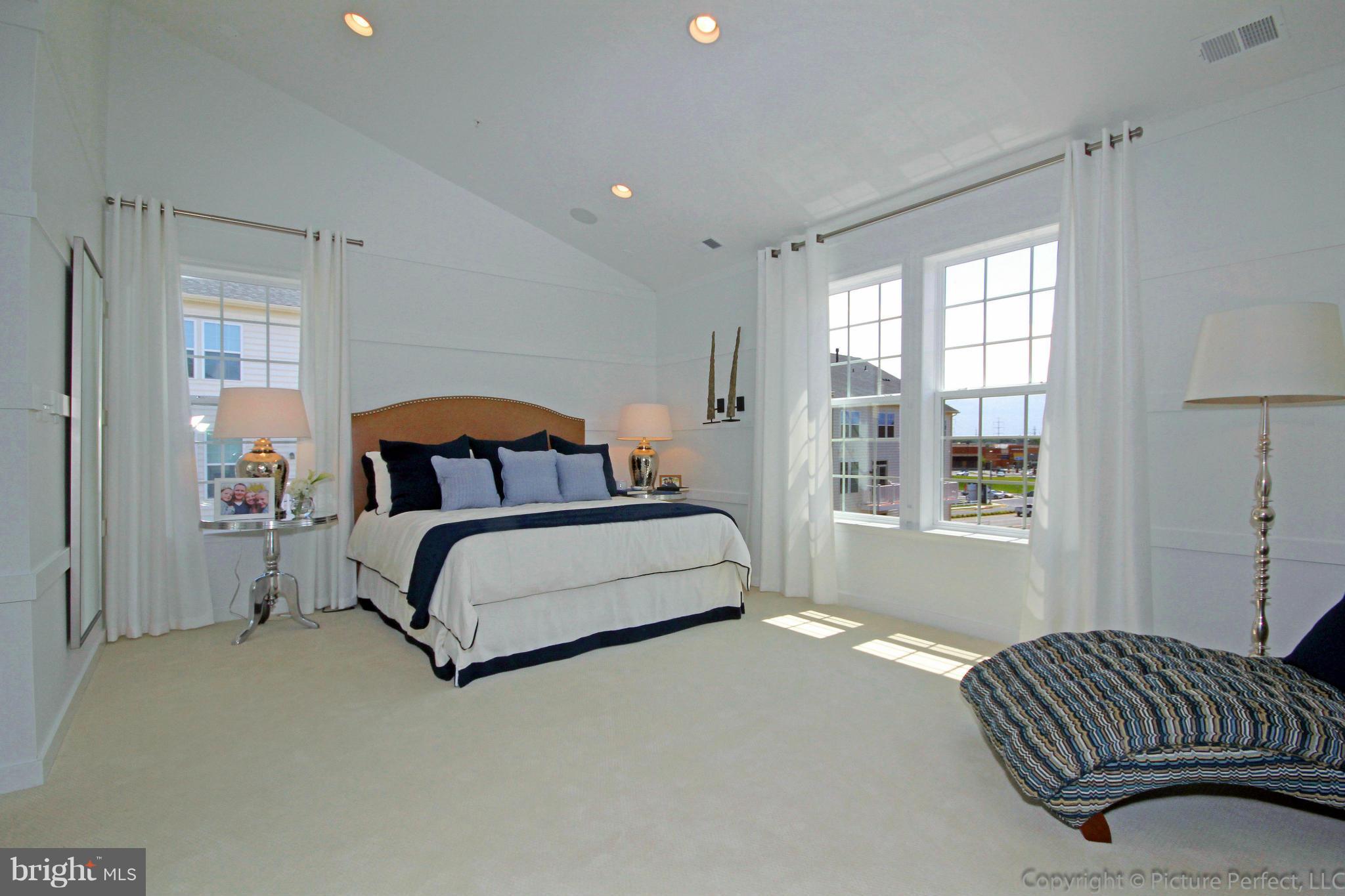112 Mill Pond Road Frederick, MD 21701 - Photo 13 of 23 a bedroom with a bed and window