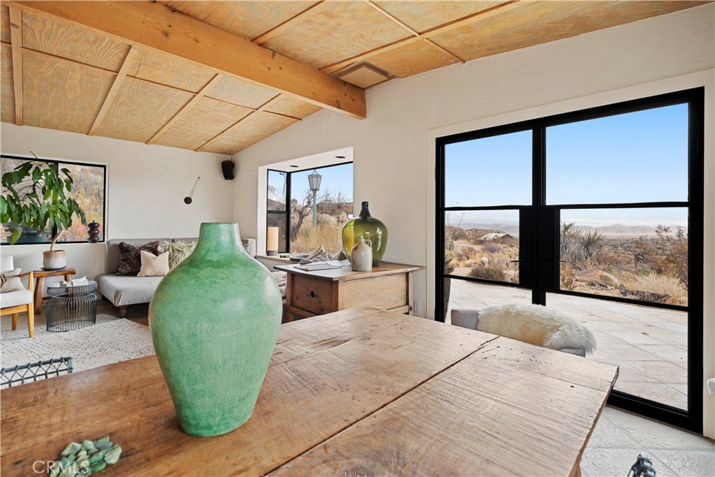 51222 Gamma Gulch Road Landers, CA 92285 - Photo 13 of 73 a living room with furniture and large window