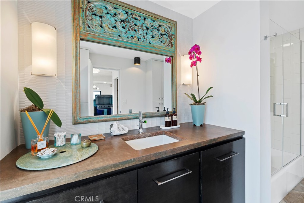 51222 Gamma Gulch Road Landers, CA 92285 - Photo 29 of 73 a bathroom with a sink and a mirror