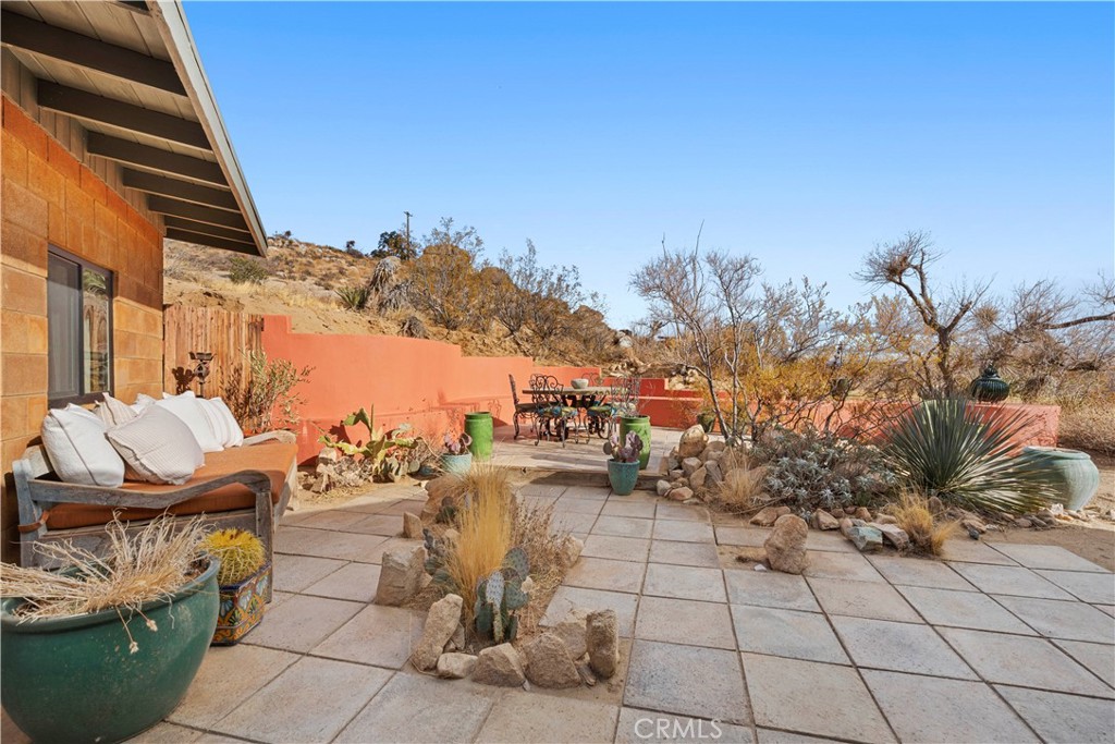 51222 Gamma Gulch Road Landers, CA 92285 - Photo 33 of 73 a view of a terrace with furniture