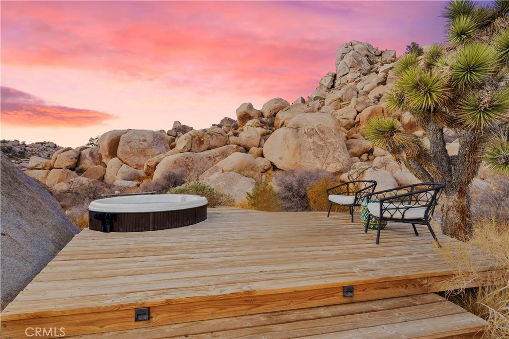 51222 Gamma Gulch Road Landers, CA 92285 - Photo 43 of 73 a view of a terrace with a bench