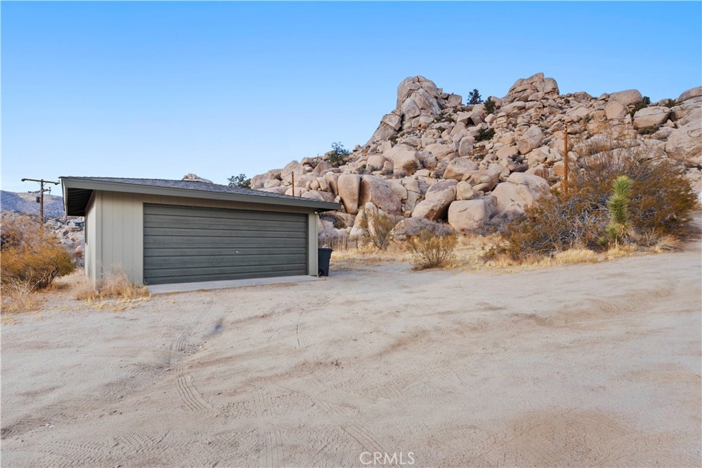 51222 Gamma Gulch Road Landers, CA 92285 - Photo 46 of 73 a view of a parking space in front of a house