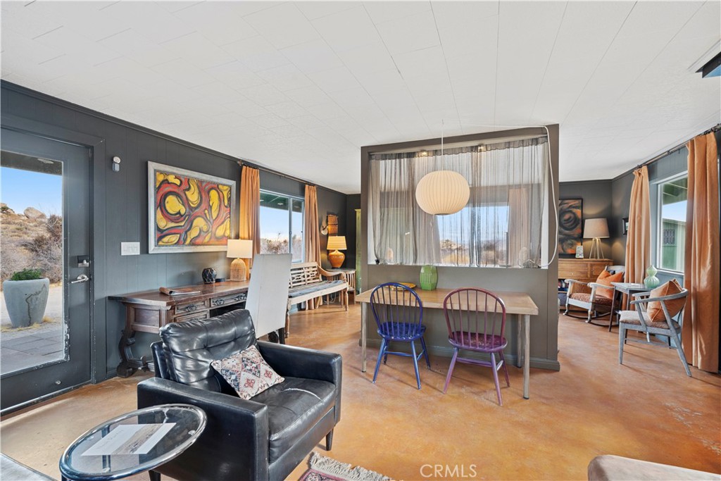 51222 Gamma Gulch Road Landers, CA 92285 - Photo 60 of 73 a living room with furniture and a large window