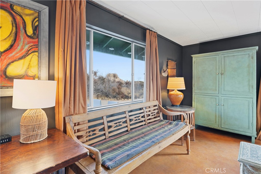 51222 Gamma Gulch Road Landers, CA 92285 - Photo 61 of 73 a living room with furniture and a window