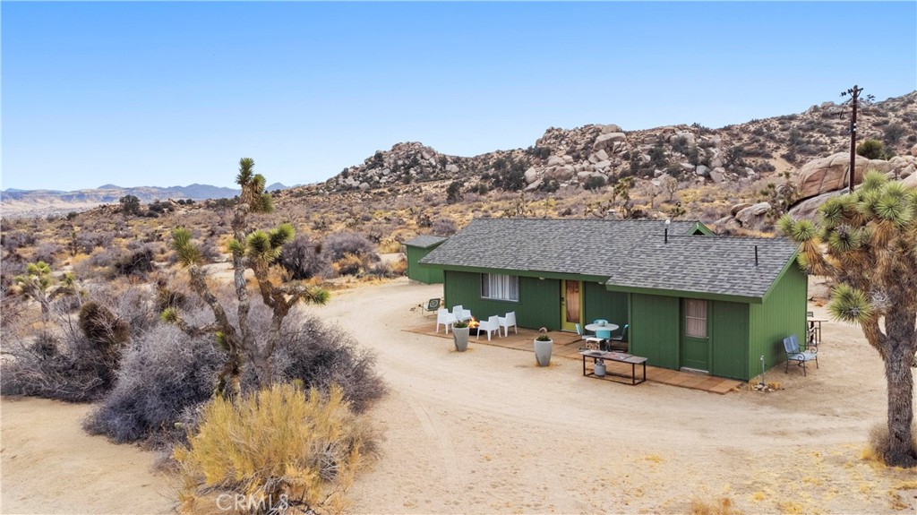 51222 Gamma Gulch Road Landers, CA 92285 - Photo 67 of 73 a view of a house with a patio