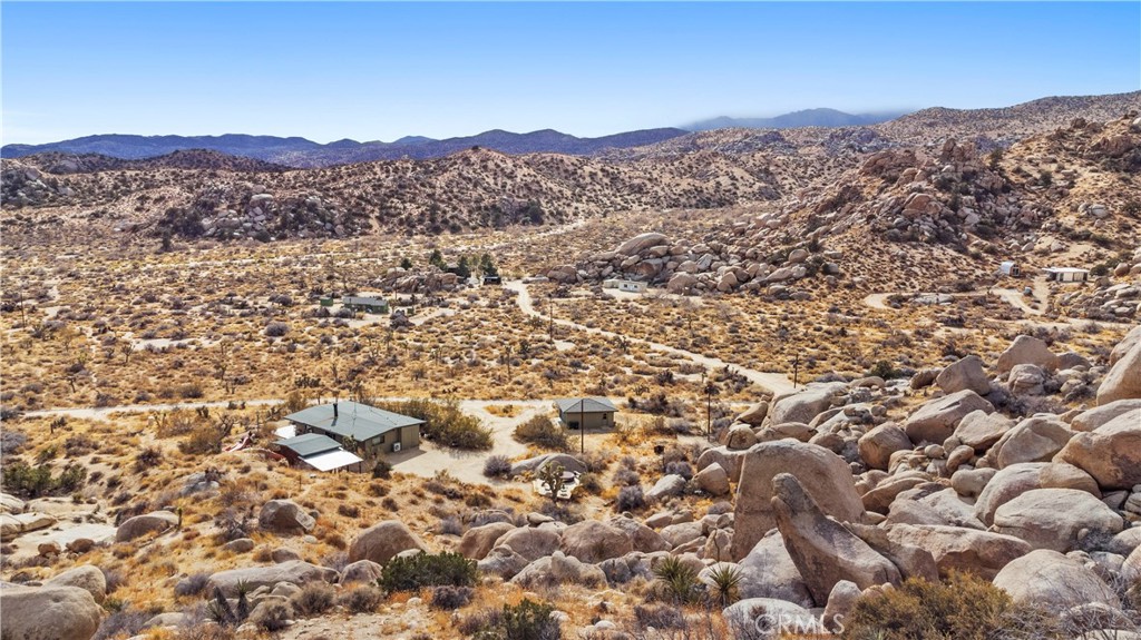 51222 Gamma Gulch Road Landers, CA 92285 - Photo 72 of 73 an aerial view of residential house and sandy dunes