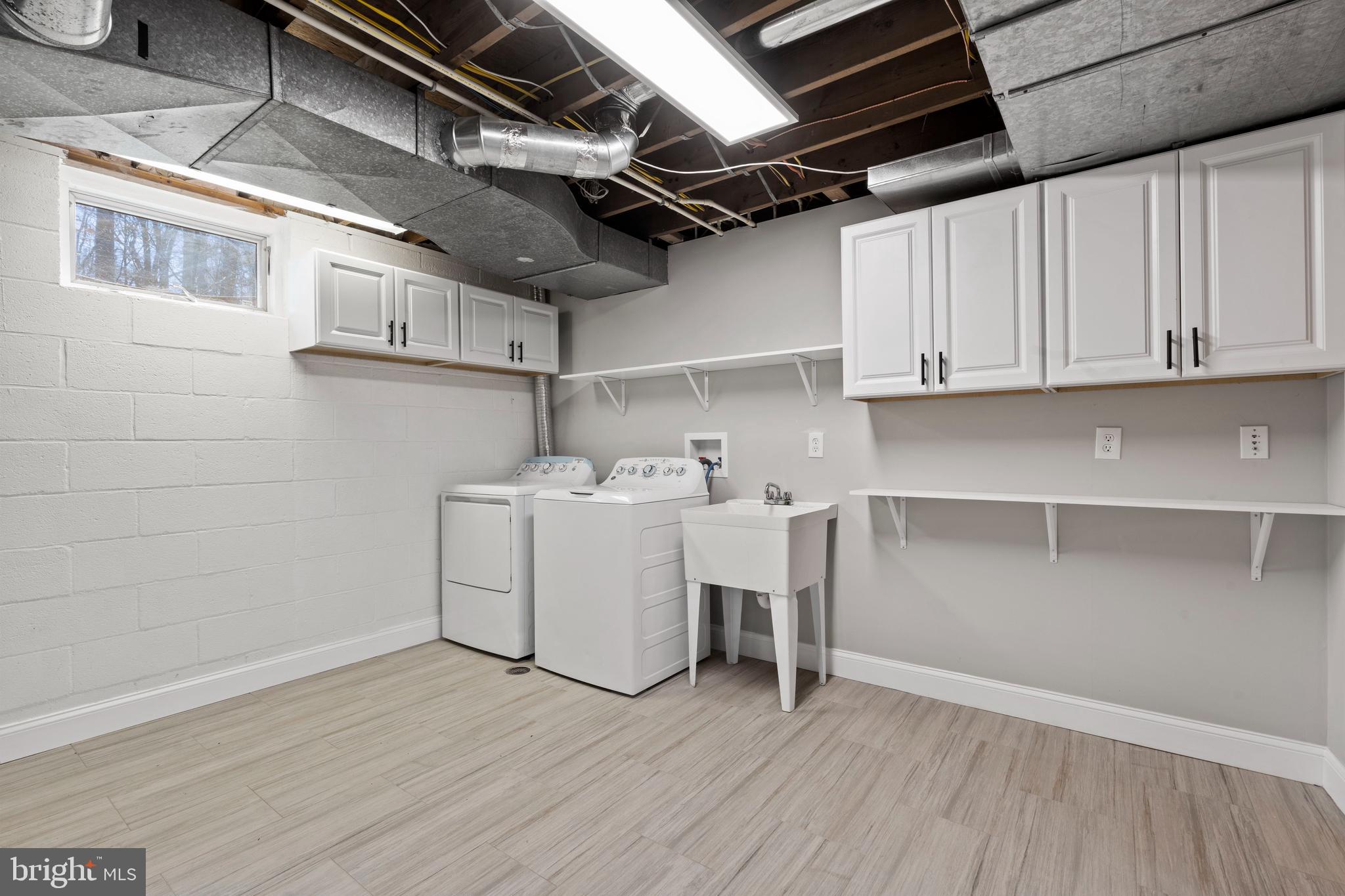 18012 Highfield Road Ashton, MD 20861 - Photo 25 of 39 Spacious laundry room/utility combo