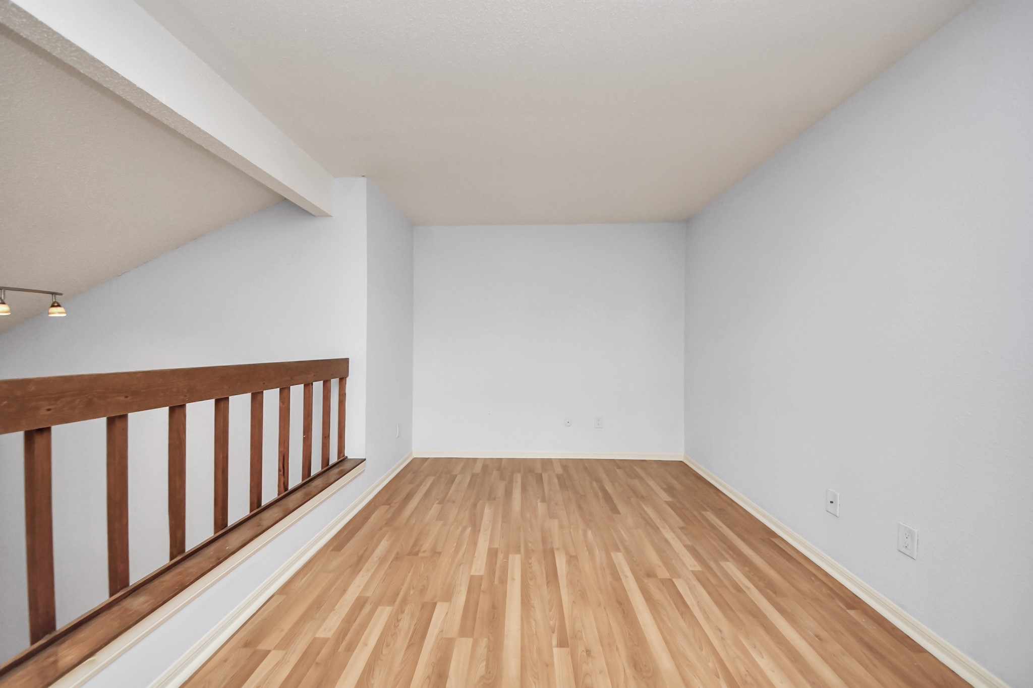 2425 Holly Hall Street, Unit C54 Houston, TX 77054 - Photo 15 of 22 a view of wooden floor in a room