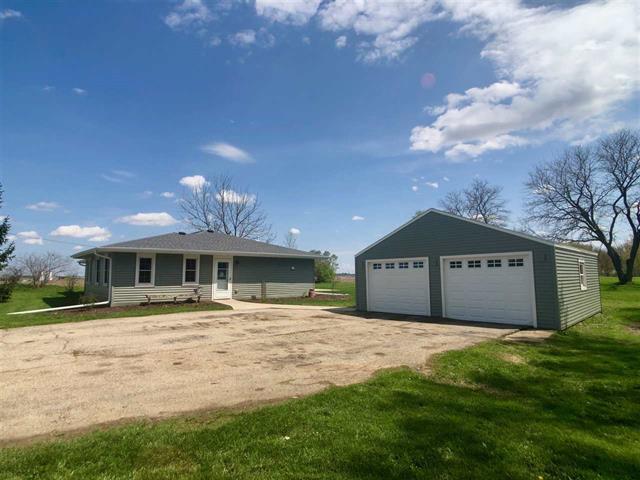 9987 East High Road Stillman Valley, IL 61084 - Photo 1 of 25 a front view of a house with a yard