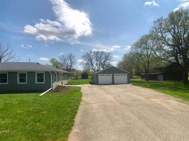 9987 East High Road Stillman Valley, IL 61084 - Photo 2 of 25 front view of a house with a yard