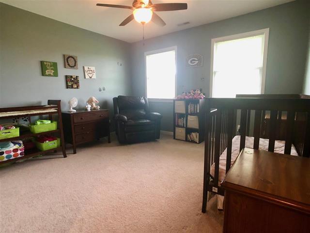 9987 East High Road Stillman Valley, IL 61084 - Photo 14 of 25 a living room with furniture